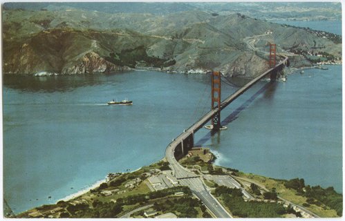 Aerial view of Golden Gate Bridge, Fort Point, Toll Plaza, and Marin County